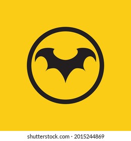 ilustración vectorial del logotipo de murciélago negro sobre fondo amarillo