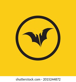 vector illustration of black bat logo on yellow background