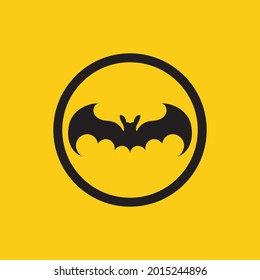 vector illustration of black bat logo on yellow background