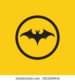 vector illustration of black bat logo on yellow background