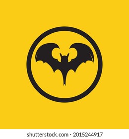 vector illustration of black bat logo on yellow background