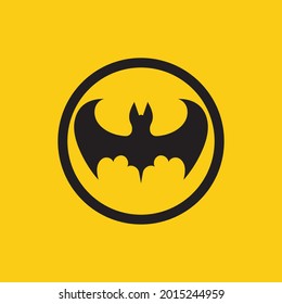 ilustración vectorial del logotipo de murciélago negro sobre fondo amarillo