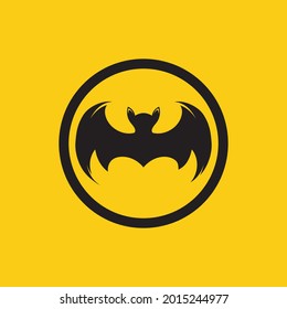 ilustración vectorial del logotipo de murciélago negro sobre fondo amarillo