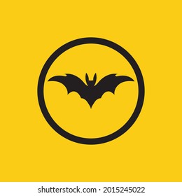 vector illustration of black bat logo on yellow background