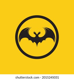 vector illustration of black bat logo on yellow background