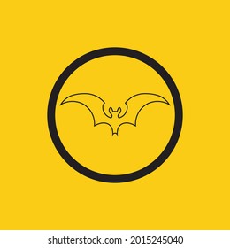 vector illustration of black bat logo on yellow background