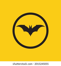 vector illustration of black bat logo on yellow background