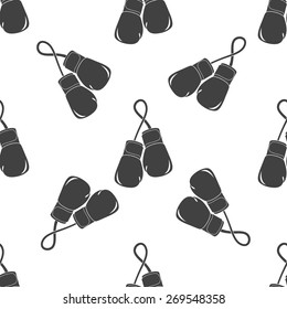 Vector illustration of black boxing gloves, mitt, mitten on white background. Seamless, pattern.