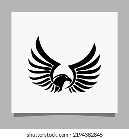 Vector illustration of a black eagle on white paper which is perfect for logos, business cards, posters and icons