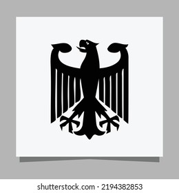 Vector illustration of a black eagle on white paper which is perfect for logos, business cards, posters and icons