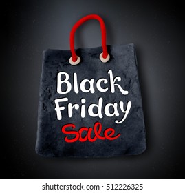 Vector illustration with Black Friday lettering and hand made plasticine shopping bag banner on black background.