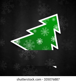 Vector illustration: Black paper-craft postcard with green christmas tree