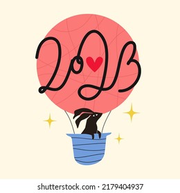 Vector illustration with black rabbit flying on pink aerostat and new year lettering number 2023. Trendy celebration print design with hare, stars and calligraphy