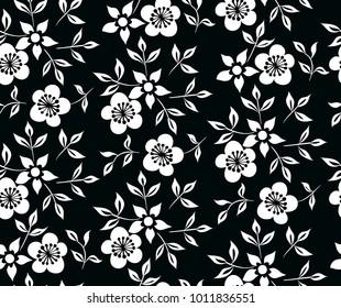 Vector illustration of black and white flowers and leafs pattern. Seamless floral ornament pattern. Hand drawn.