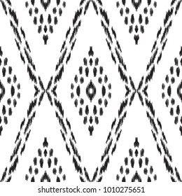 Vector illustration of black and white ikat seamless pattern. Design in ethnic style.