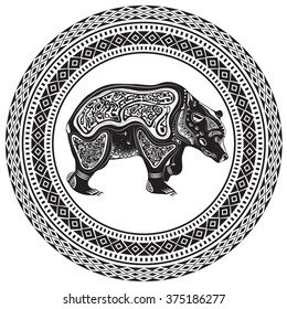 Vector illustration of a black and white tattoo wild animal in an ornamental circle for your arts and design