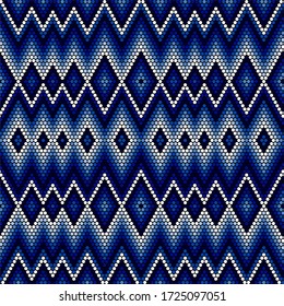 vector illustration of blue color tones abstract seamless pattern inspired in mexican huichol art style.Can be tiled