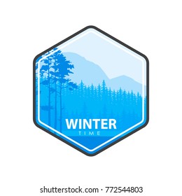 Vector illustration of blue colored forest and winter time words in emblem.