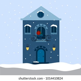 
vector illustration of a blue house in winter with a falling snow and red flower