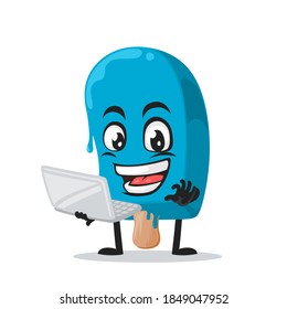 vector illustration blue ice cream on stick mascot or character presentation with laptop