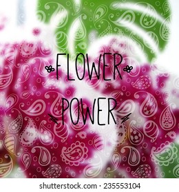 Vector illustration. Blurred photographic background with orchid and text Flower power