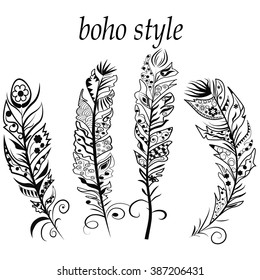 Vector illustration in boho style. Black feathers are on the white background.