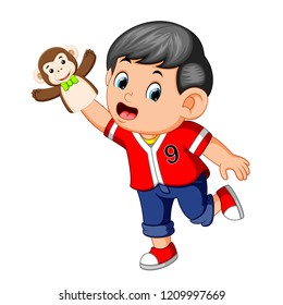 vector illustration of the boy was using monkey puppet