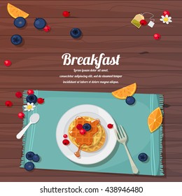 vector illustration of breakfast table with waffles, tea and fresh berries