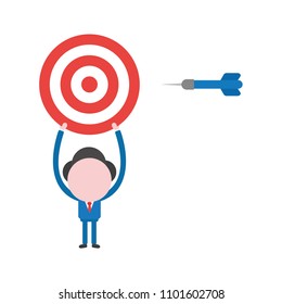Vector illustration businessman character holding up bulls eye with dart.