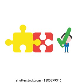 Vector illustration businessman character with two connected jigsaw puzzle pieces and holding check mark.