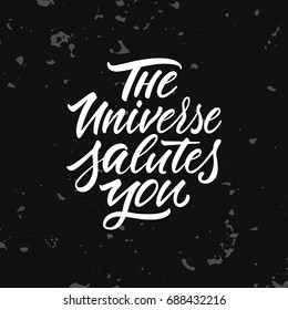 Vector illustration. Calligraphy. Lettering. Phrase: "The universe salutes you." Prints for clothes, bags, postcards and other.