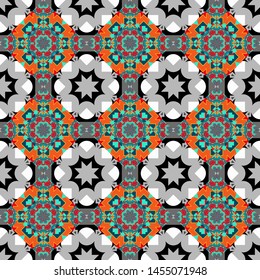 Vector illustration. It can be used in the design of textiles, in the printing industry. Kaleidoscopic seamless pattern in orange, blue and gray colors.