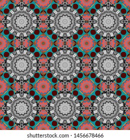 Vector illustration. It can be used in the design of textiles, in the printing industry. Kaleidoscopic seamless pattern in red, blue and gray colors.