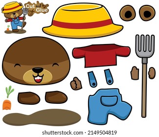 Vector illustration of cartoon bear in farmer costume with pitchfork plant carrot. Cutout and gluing