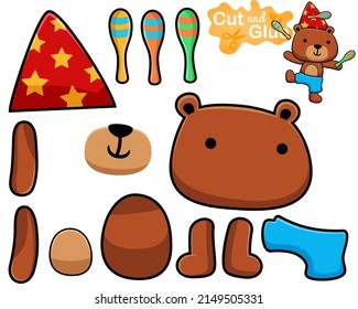 Vector illustration of cartoon bear juggling skittles in circus show. Cutout and gluing