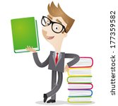 Vector illustration of a cartoon businessman leaning against a stack of colorful books and holding a green one up in his hand.