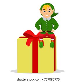 Vector illustration of a cartoon cute elf sitting on a box with a gift. Isolated white background. Flat style. Fairy-tale character at Christmas. Boy Holiday Elf with present.
