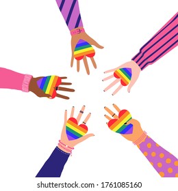 Vector illustration of cartoon flat Hands Holding Hearts with rainbow colors. LGBTQ+  symbol of Love, Freedom, Peace, Lesbian. Gay Pride Community Month