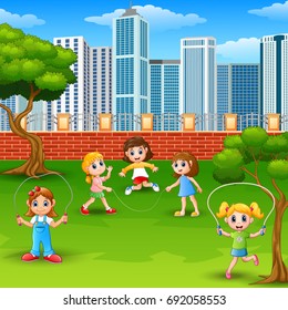 Vector illustration of Cartoon girls playing jumping rope in the park