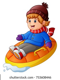 Vector illustration of Cartoon happy boy riding an inflatable sled