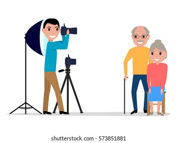Vector illustration cartoon male photographer takes pictures photo grandparents. Isolated white background. Man professional photographer in studio. Side view, profile, flat style.