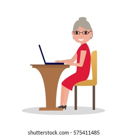 Vector illustration cartoon old woman sitting at desk with a laptop. Isolated white background. Grandmother works at laptop. Elderly female in glasses sitting behind a computer. Flat style, side view.