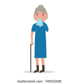 Vector illustration cartoon old woman caught a cold, sneezing, ill. Isolated white background. Grandmother has flu, sneeze, spring allergies. Flat style. Woman allergic sneezing into a handkerchief.