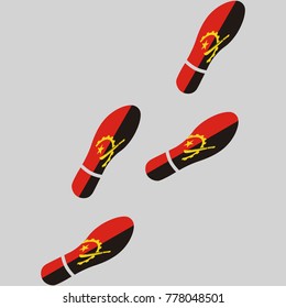 Vector illustration of chain of trails of shoes isolated on grey background, painted in the colors of national flag of Angola