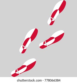 Vector illustration of chain of trails of shoes isolated on grey background, painted in the colors of national flag of Greenland