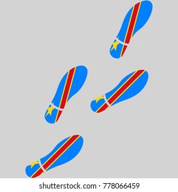 Vector illustration of chain of trails of shoes isolated on grey background, painted in the colors of national flag of Democratic Republic of Congo