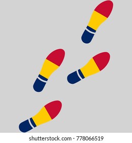 Vector illustration of chain of trails of shoes isolated on grey background, painted in the colors of national flag of Chad