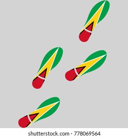 Vector illustration of chain of trails of shoes isolated on grey background, painted in the colors of national flag of Guyana