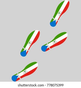 Vector illustration of chain of trails of shoes isolated on grey background, painted in the colors of national flag of Equatorial Guinea