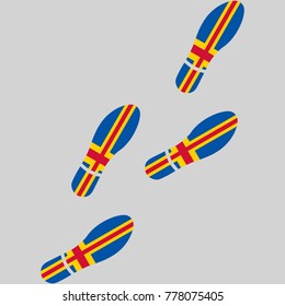 Vector illustration of chain of trails of shoes isolated on grey background, painted in the colors of national flag of Aland Islands